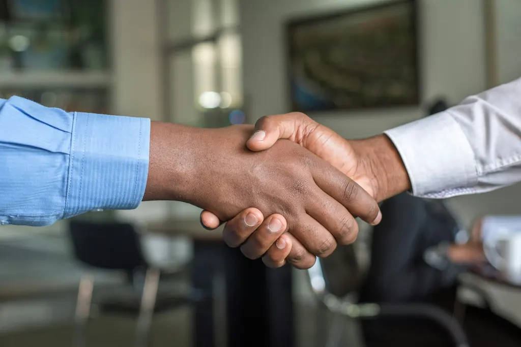 Two business owners shaking hands